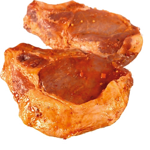 Мариновані свинячі відбивні на кістці